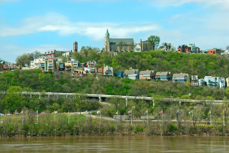 Holy Cross Immaculata Church sits atop Mt Adams in Cincinnati, as seen from across the Ohio River in Kentucky.